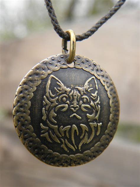 Fearful feline talisman pendant
